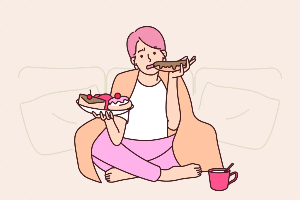 girl eating cake on the bed